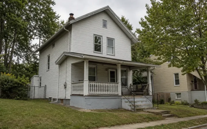 Older Pittsburgh-area house with a small front porch